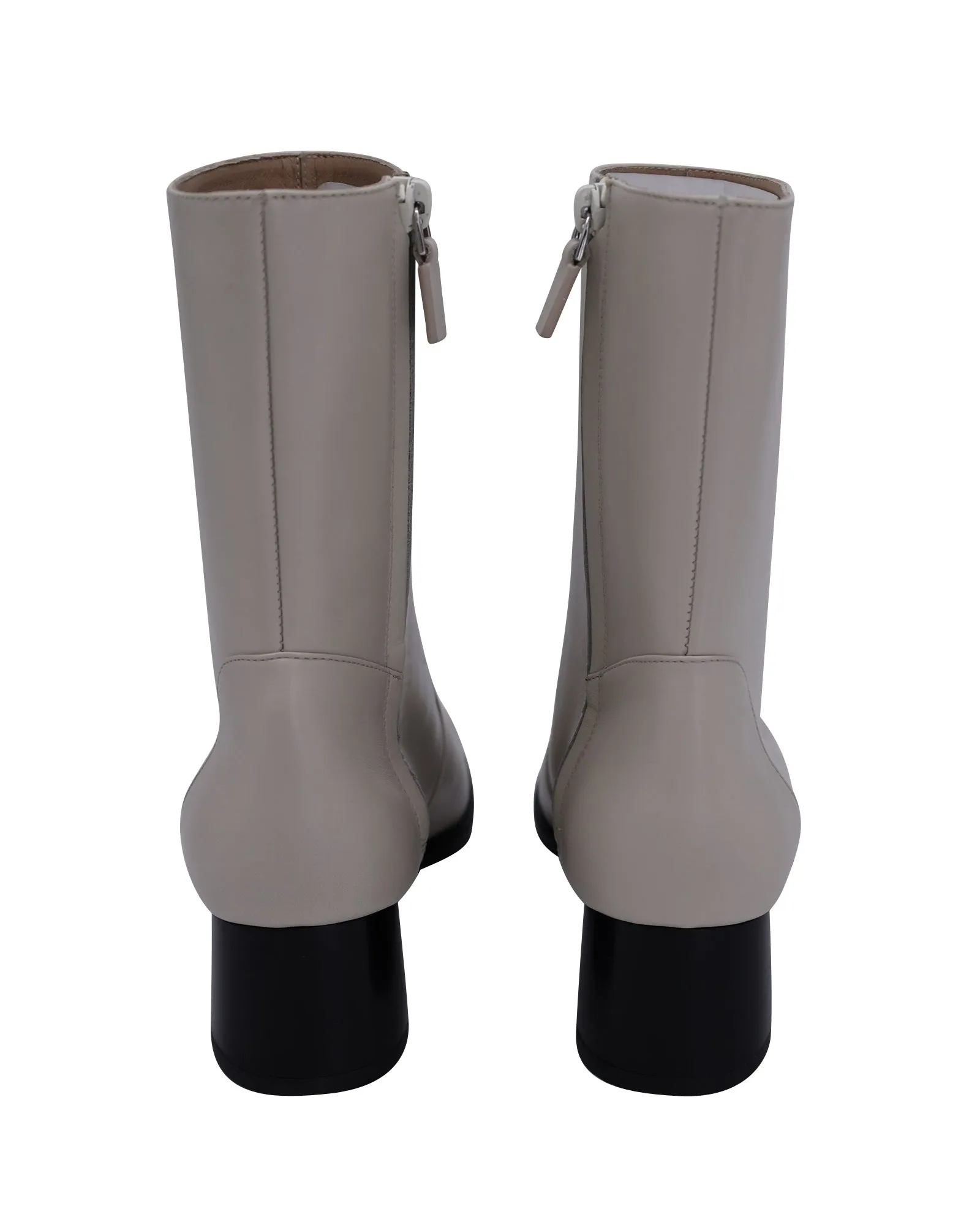 Stuart Weitzman Nola Zipped Booties in Cream Leather